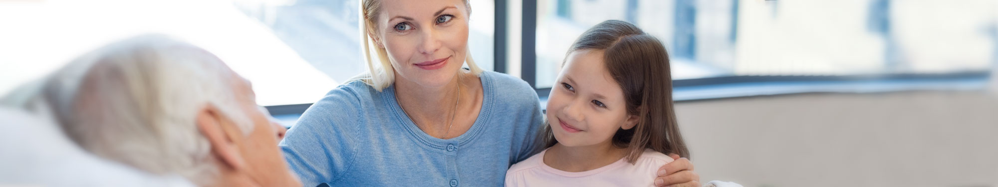 mom and daughter visiting a patient